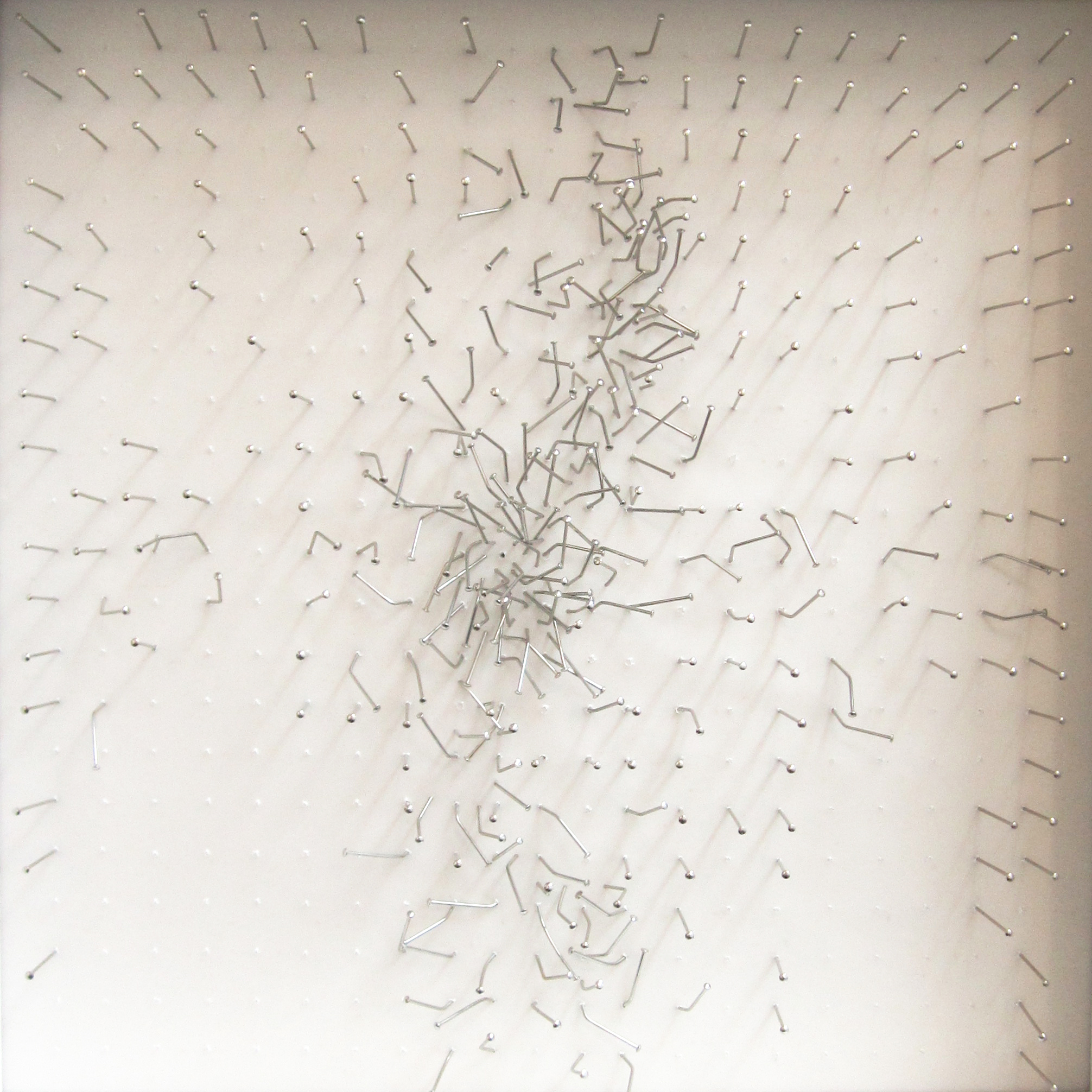 Untitled
2011
Nails and tracing paper
25cm x 25cm